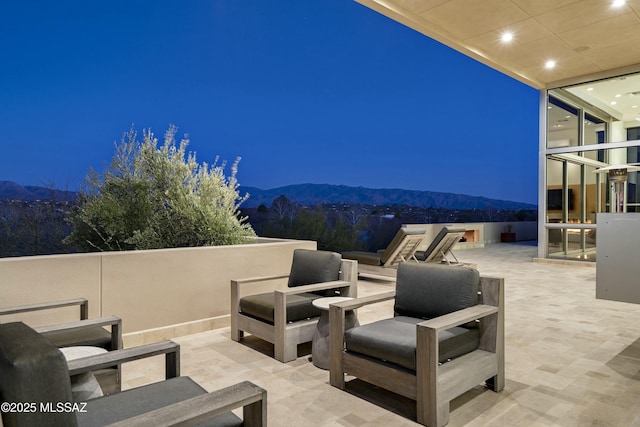 view of patio featuring a mountain view