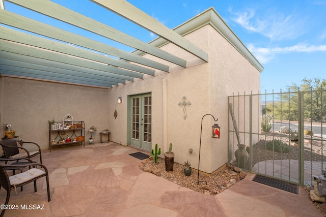 view of patio featuring french doors