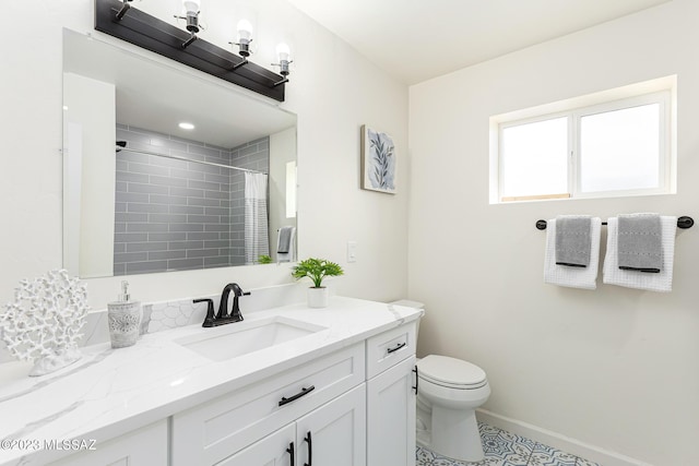 bathroom featuring toilet, vanity, tile patterned floors, and walk in shower