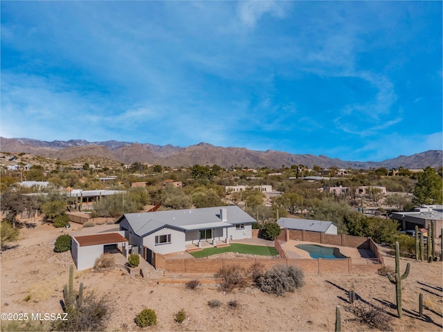 drone / aerial view featuring a mountain view