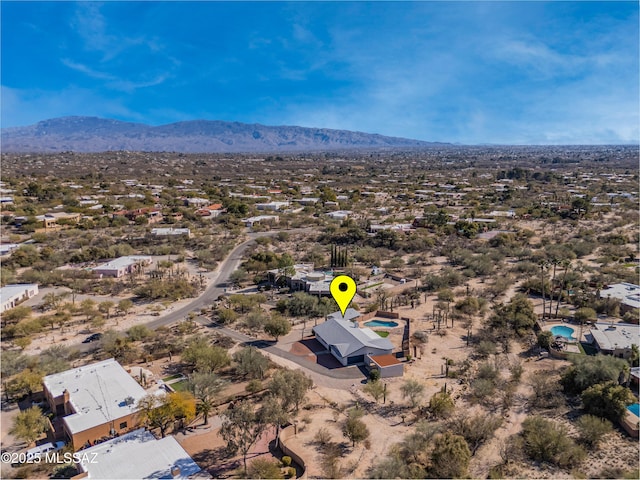 drone / aerial view featuring a mountain view