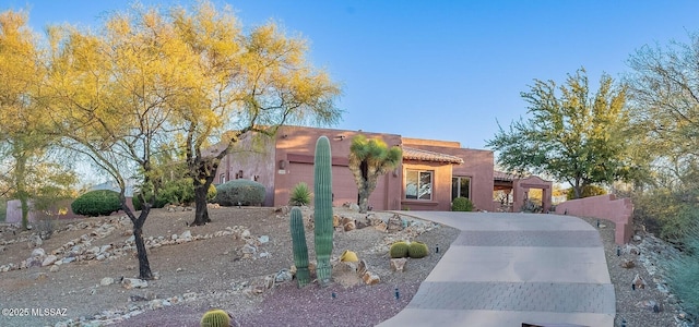 adobe home with a garage