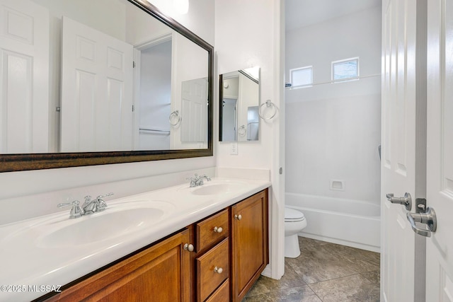 full bathroom featuring vanity, shower / bathtub combination, and toilet