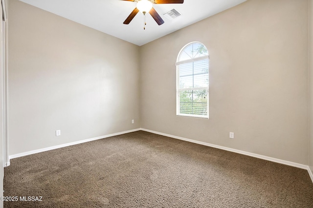 unfurnished room featuring ceiling fan and carpet flooring