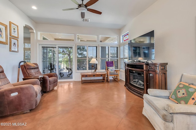 living room featuring ceiling fan