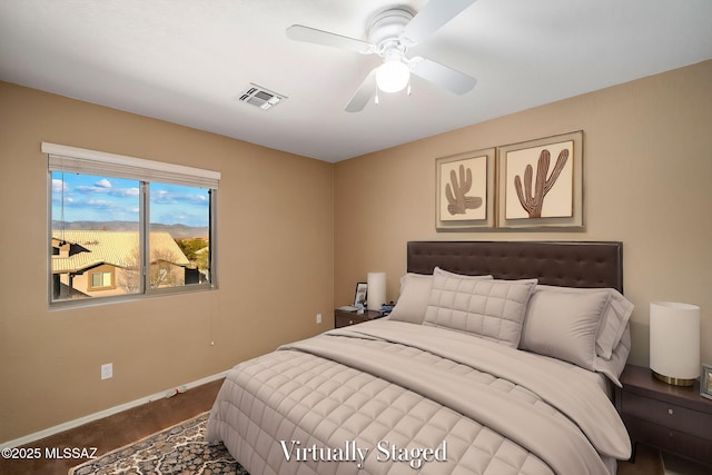 bedroom featuring ceiling fan and carpet flooring