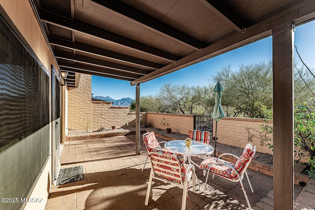 view of patio featuring a mountain view