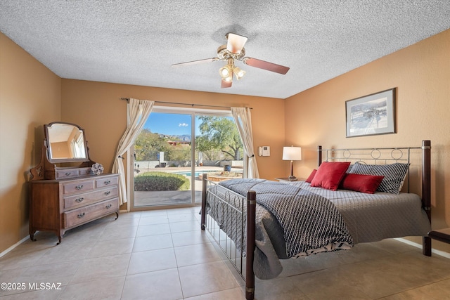 tiled bedroom with access to outside, a textured ceiling, and ceiling fan