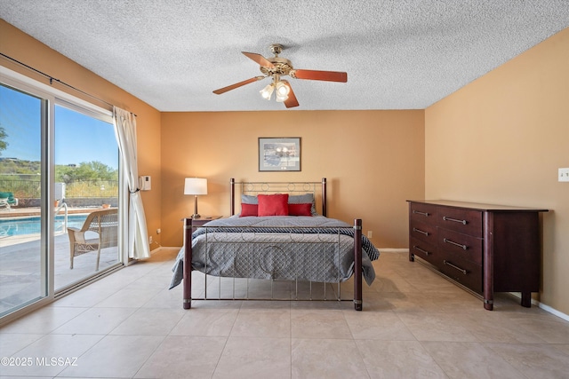 bedroom featuring light tile patterned flooring, ceiling fan, and access to exterior