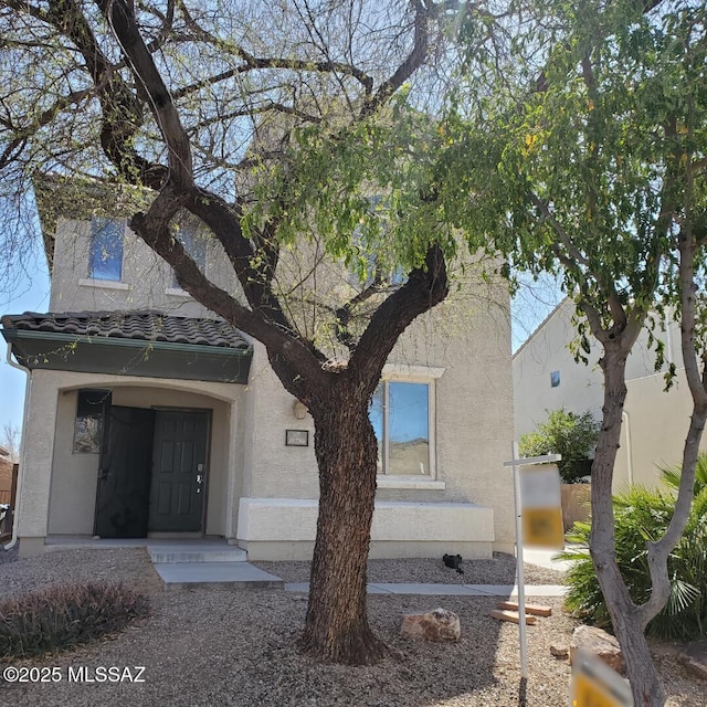 view of front of property featuring stucco siding