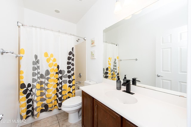 full bathroom with tile patterned flooring, toilet, vanity, and shower / bathtub combination with curtain