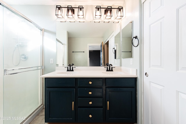 bathroom with vanity and walk in shower