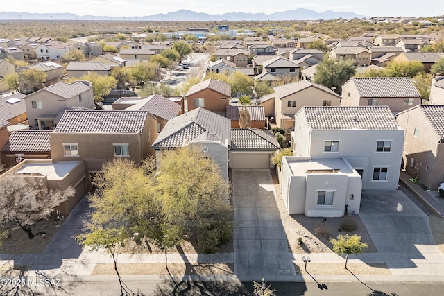 bird's eye view with a mountain view and a residential view