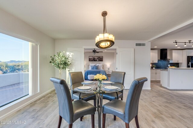 living room with light hardwood / wood-style flooring