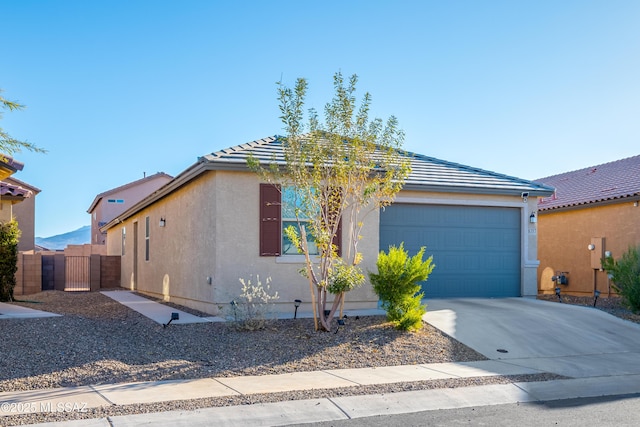 view of front of property with a garage