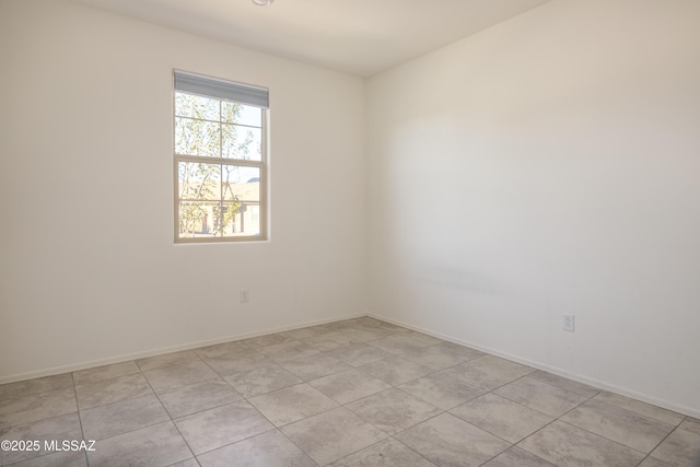 view of tiled spare room