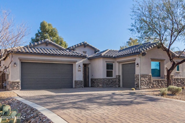 mediterranean / spanish-style home featuring a garage