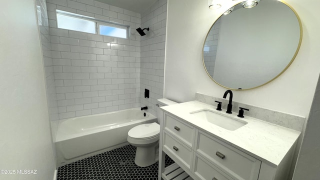 full bathroom with toilet, tiled shower / bath combo, and vanity