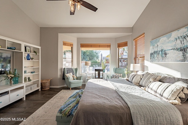 bedroom with ceiling fan and dark hardwood / wood-style floors