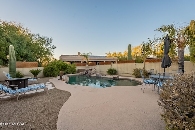 view of pool featuring a patio area