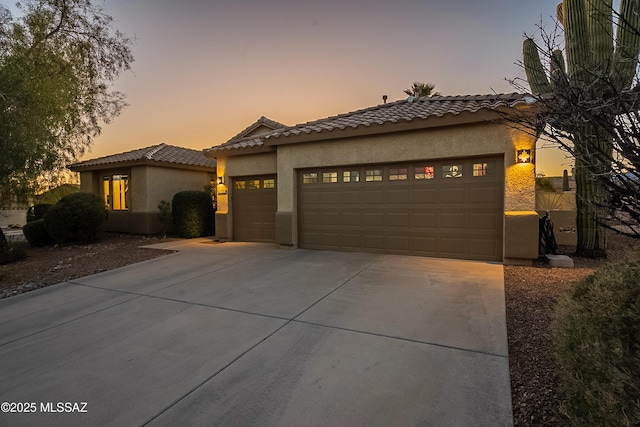 view of front of property featuring a garage