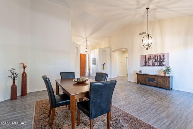 dining room featuring ceiling fan and dark hardwood / wood-style floors