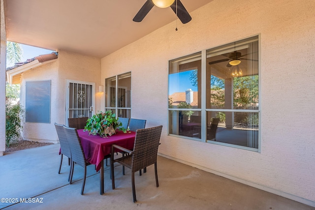 view of patio / terrace featuring ceiling fan