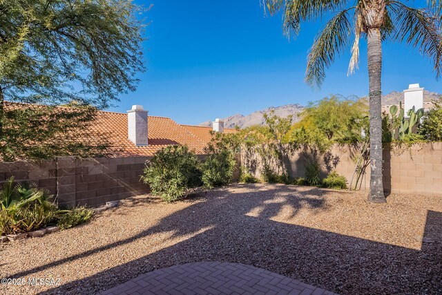 view of patio featuring ceiling fan