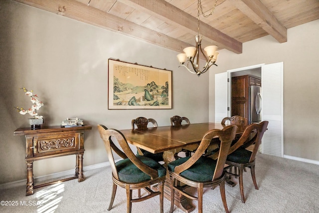 carpeted dining area with beam ceiling, wooden ceiling, and a chandelier