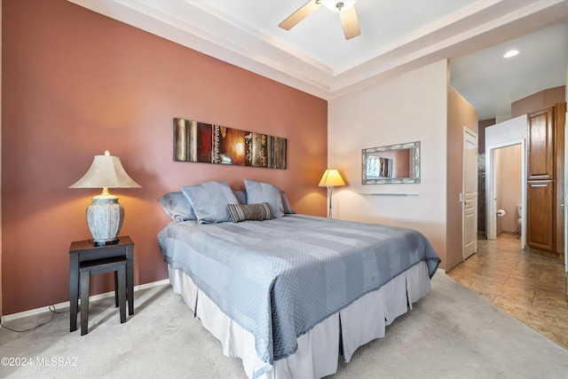 bedroom featuring ceiling fan and light colored carpet