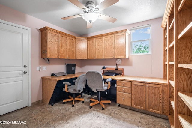 office area with ceiling fan