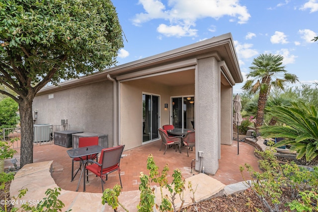 view of patio with central AC unit