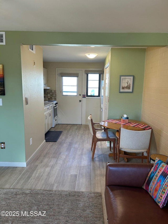 dining area featuring light hardwood / wood-style floors