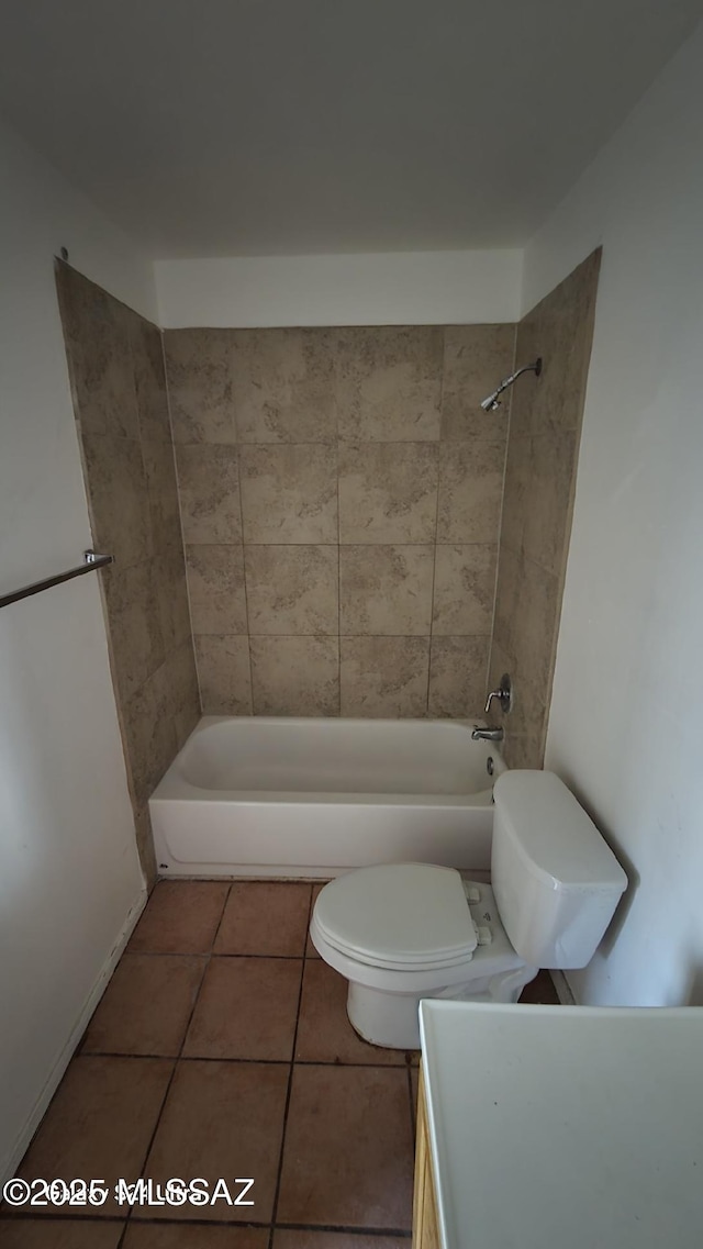 full bathroom with tile patterned flooring, vanity, toilet, and tiled shower / bath combo