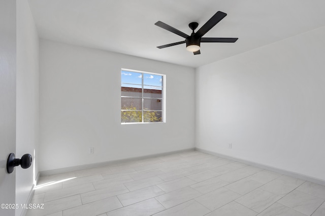 empty room featuring ceiling fan