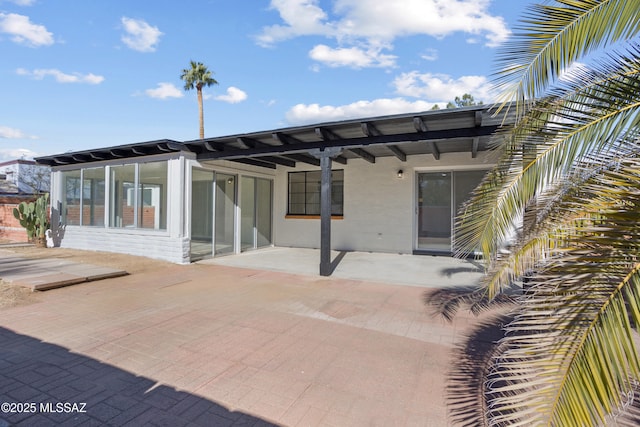 back of house featuring a patio area