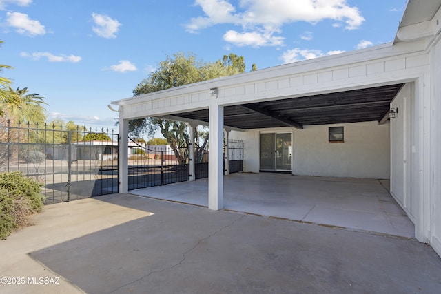 view of patio / terrace with a carport