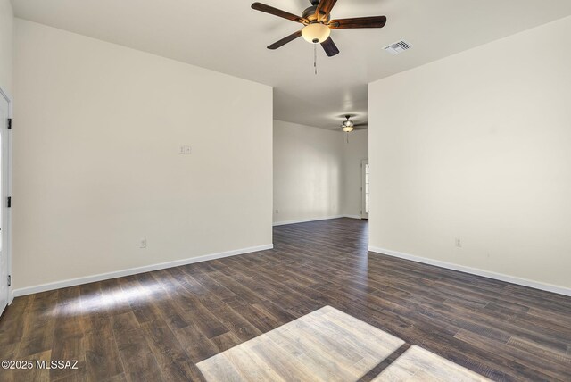 unfurnished room featuring ceiling fan, french doors, and dark hardwood / wood-style floors