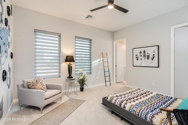 carpeted bedroom with ceiling fan