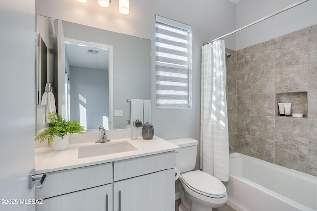 full bathroom with vanity, toilet, and shower / bathtub combination with curtain