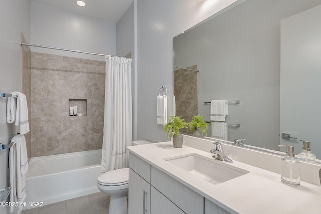 full bathroom featuring tile patterned flooring, shower / bath combo, toilet, and vanity