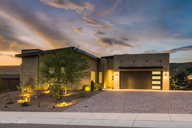 view of front of house with a garage