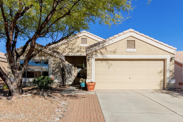 single story home featuring a garage