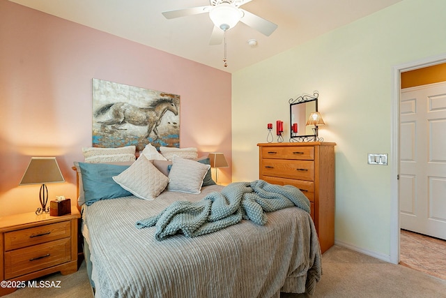 carpeted bedroom with baseboards