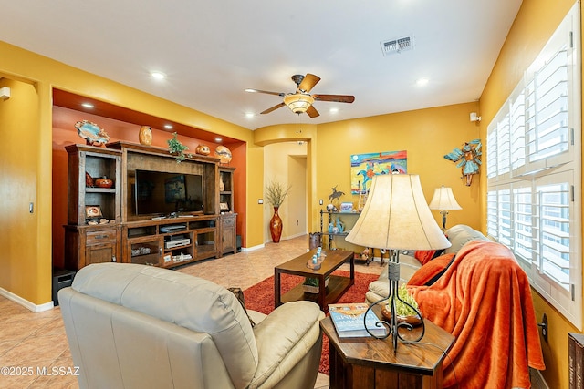 tiled living area with recessed lighting, visible vents, baseboards, and a ceiling fan