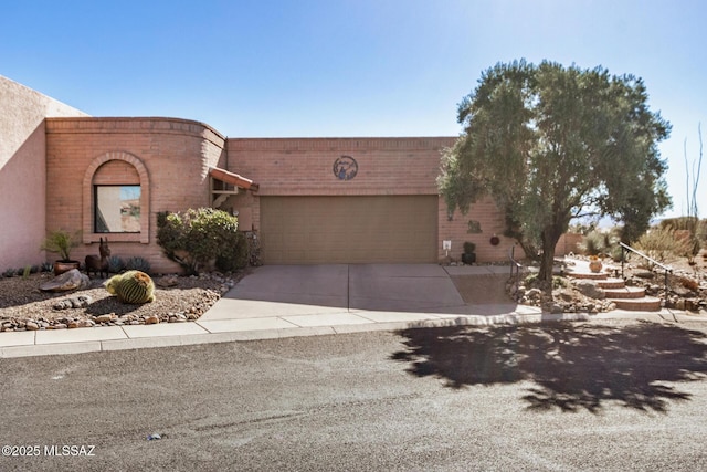 3941 S Placita De La Moneda, Green Valley, AZ 85622 - view of front of home with a garage