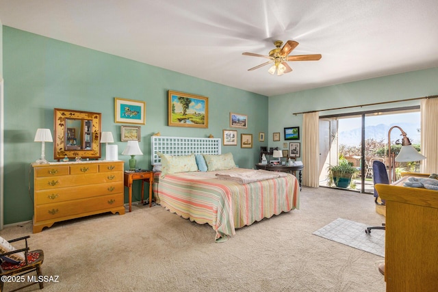 3941 S Placita De La Moneda, Green Valley, AZ 85622 - bedroom featuring access to exterior, carpet flooring, and ceiling fan