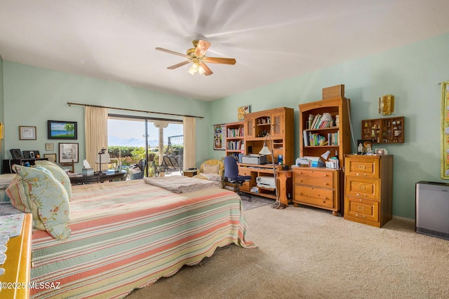 bedroom with ceiling fan, access to exterior, and light carpet