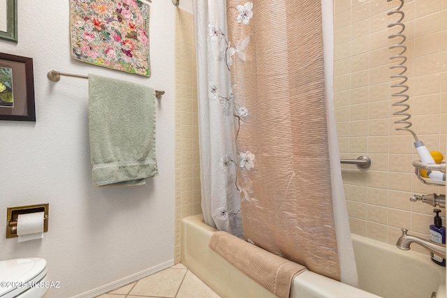 bathroom with tile patterned flooring, toilet, and shower / bath combo with shower curtain