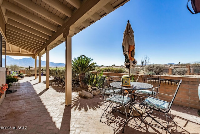 view of patio featuring a mountain view